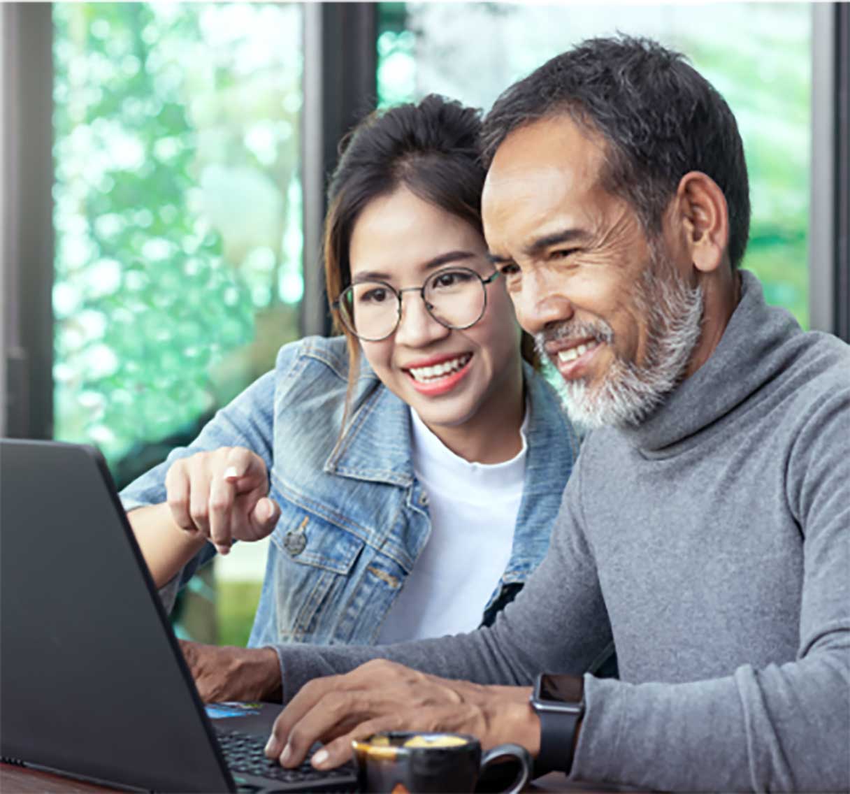 Man and woman on laptop