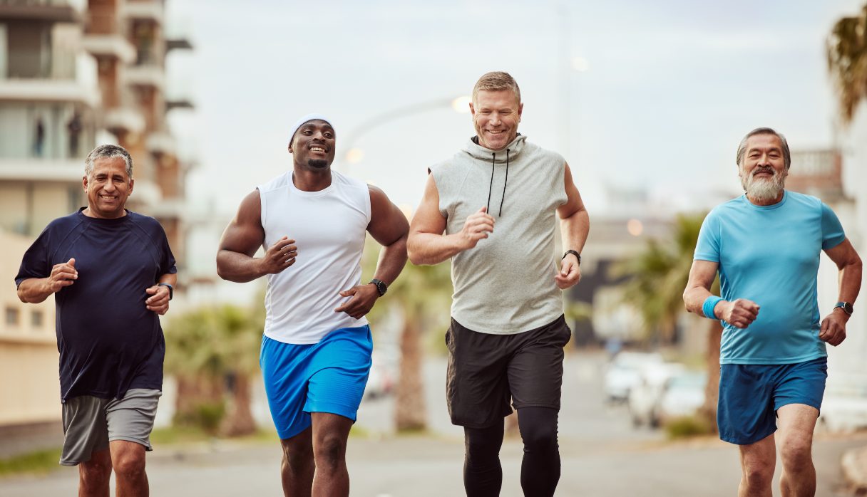 Four men running outside