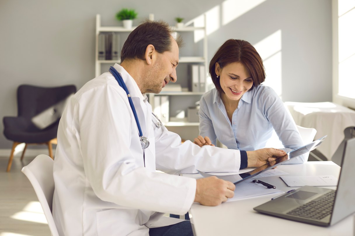 Doctor and patient looking at scan results