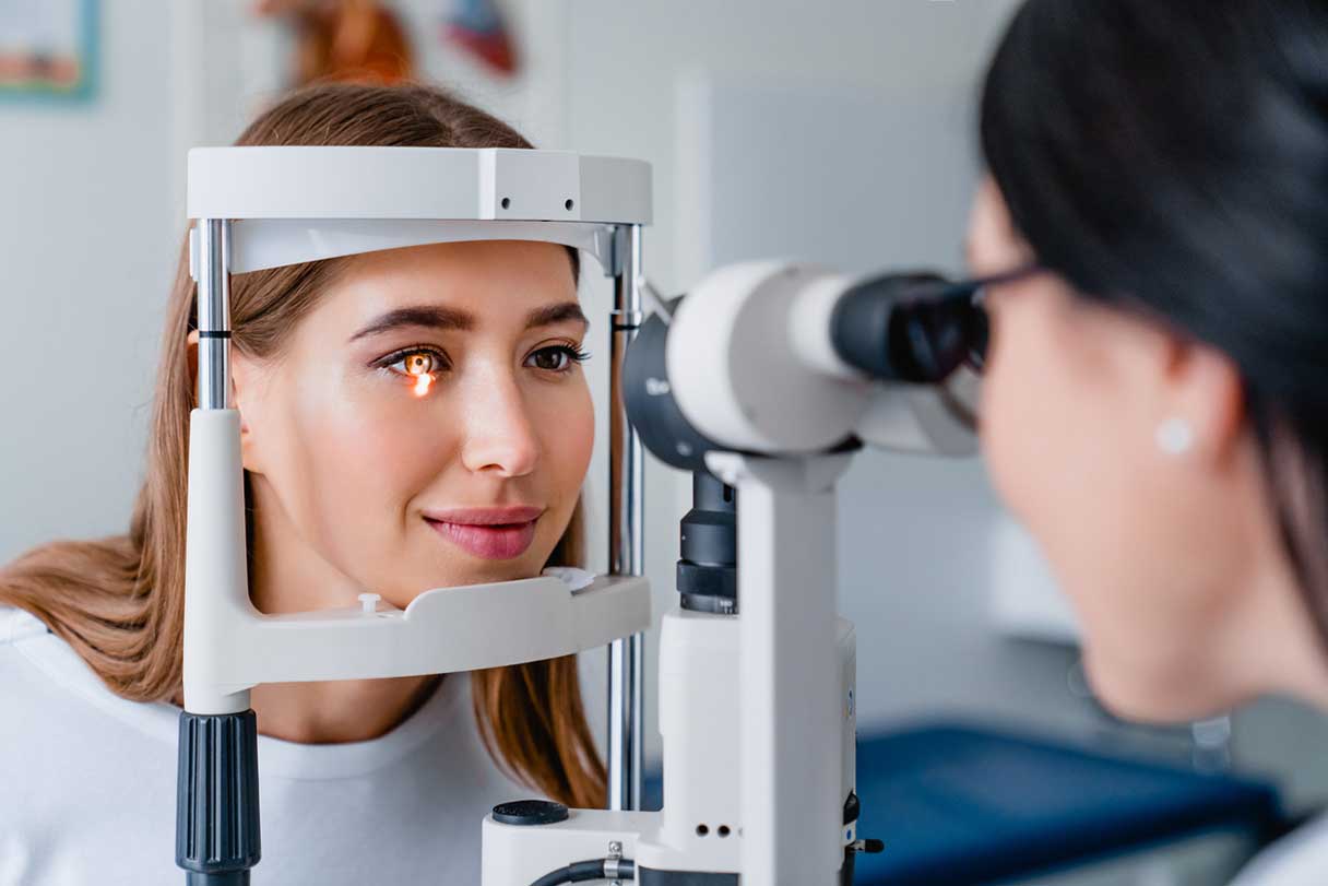 Patient engaging in eye pressure exam
