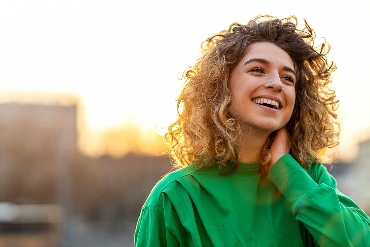 Smiling woman outside