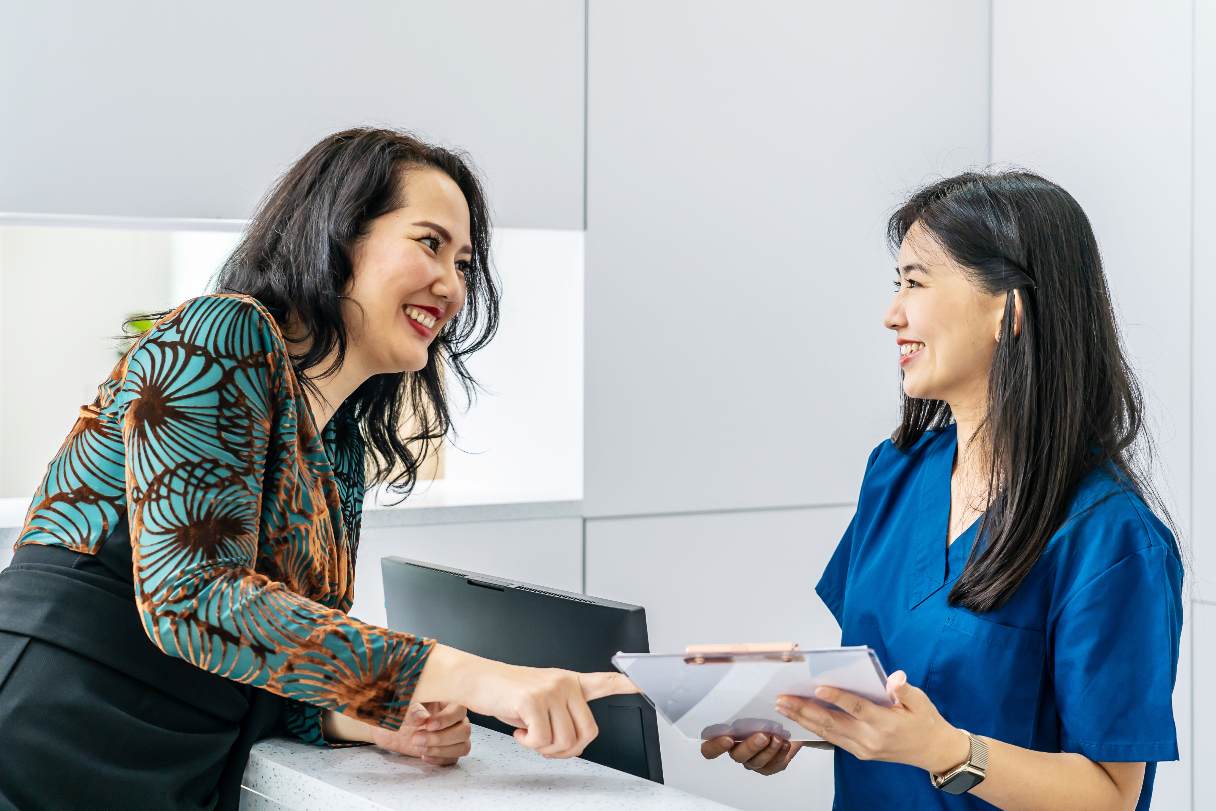 Woman speaking with healthcare professional