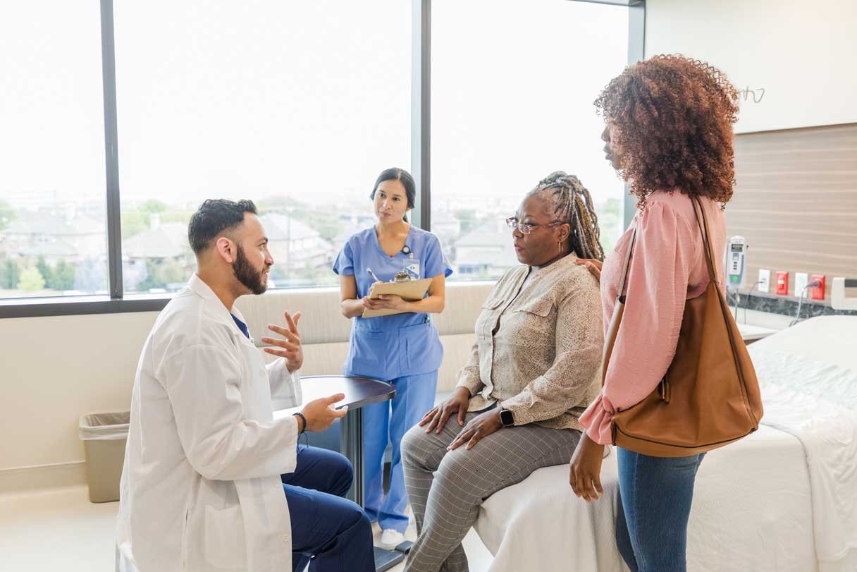 Doctor speaking with patient